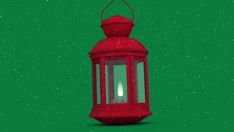 animación de nieve cayendo sobre linterna roja sobre fondo verde