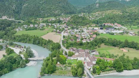 small mountain village with drone shot with cloudy sky