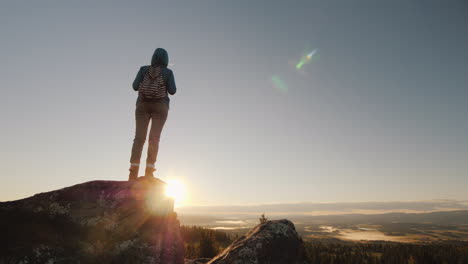 Woman-Tourist-At-The-Peak-Of-The-Mountain-At-Sunrise-Active-And-Healthy-People-Travel-In-Norway