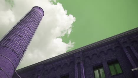 purple industrial building and chimney