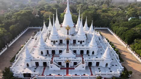 4k cinematic panning towards wat asokaram temple at sunset in samut prakan, bangkok, thailand