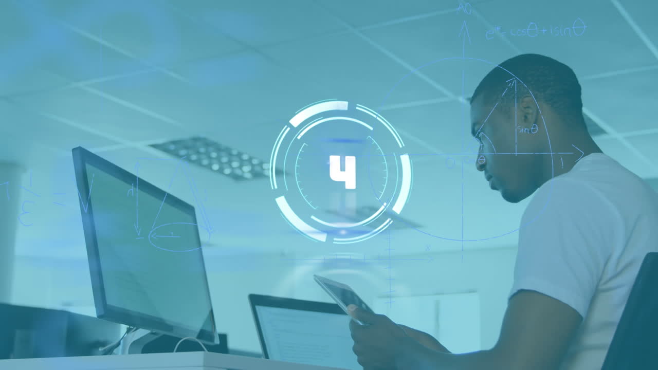 Animation of scope scanning with countdown over businessman using tablet in office