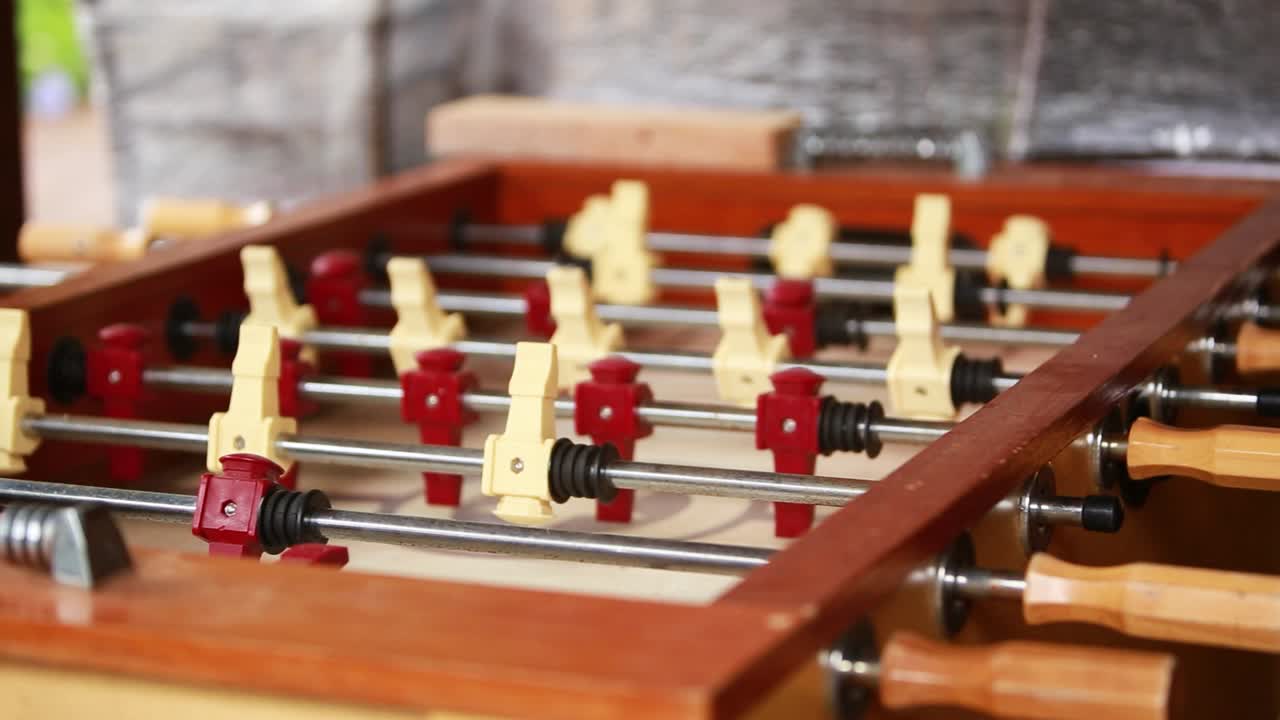 Panning across a vacant foosball table