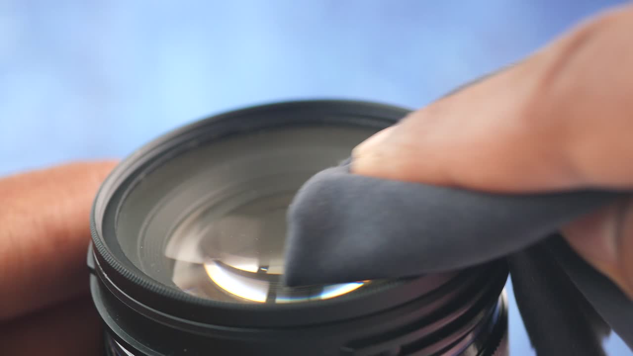 Cleaning a camera lens
