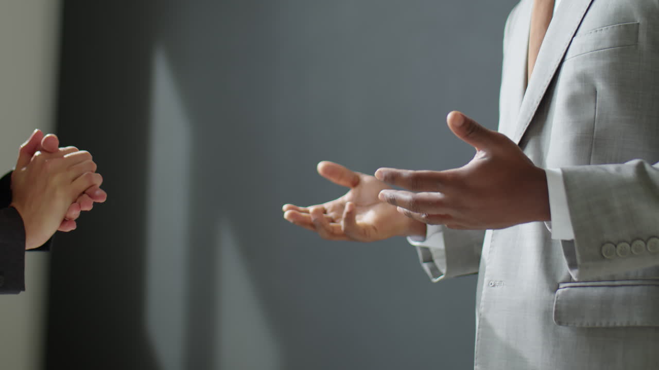 Business Partners Striking Deal and Shaking Hands