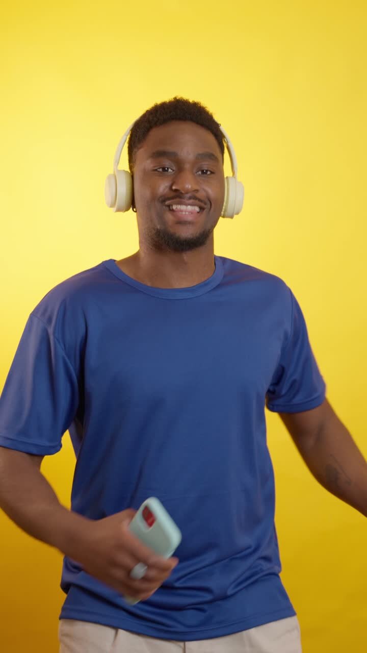 Man listening to music and dancing