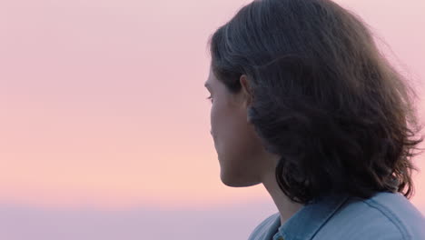 close up portrait of beautiful woman exploring spirituality looking up praying contemplating journey with wind blowing hair in countryside enjoying peaceful sunset