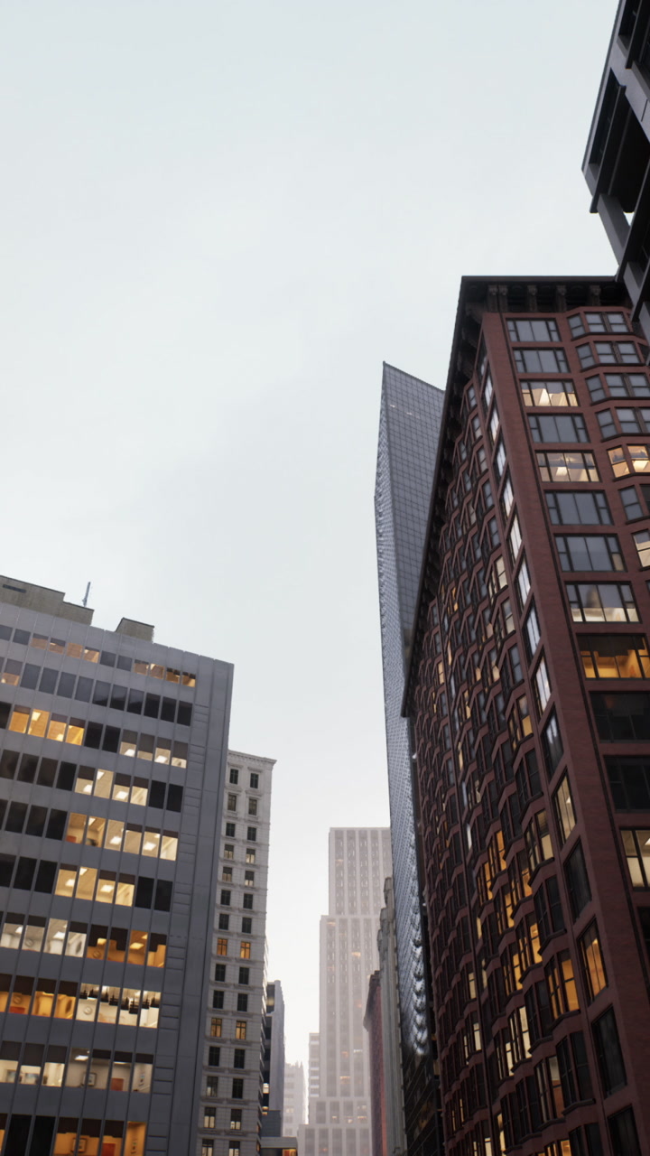 Nighttime city street illuminated by office and building lights