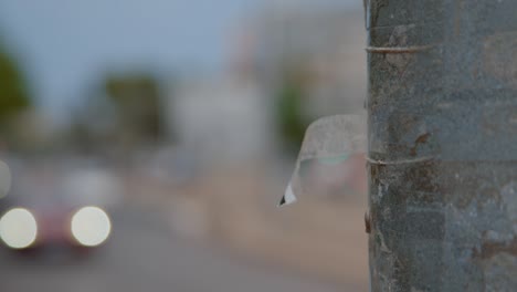 a piece of tape on a pole