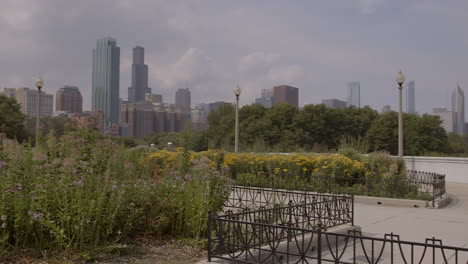 Slow-pan-of-Chicago-skyline-from-gardens-at-Ivy-Lawn-on-a-pretty-summer-day