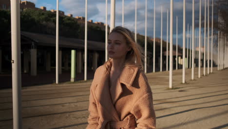 young woman walking outdoors.