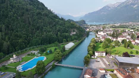 interlaken jungfrau region switzerland pull back drone aerial reverse reveal