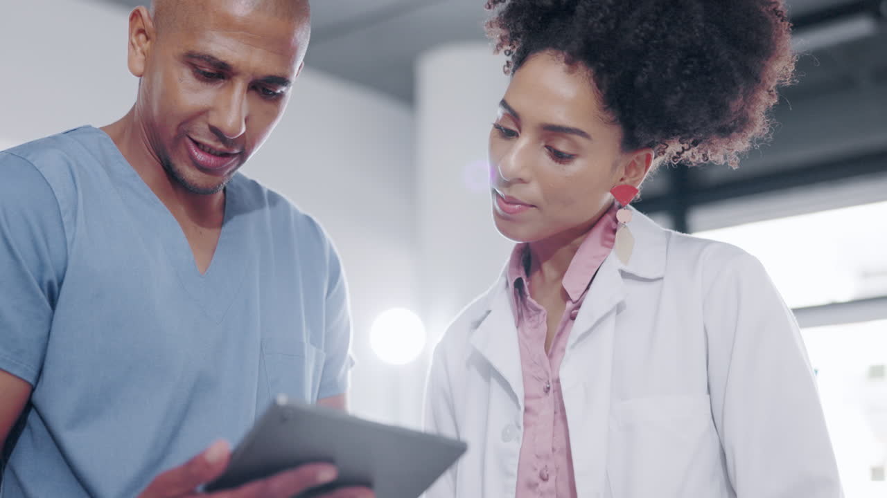 Teamwork, tablet and doctors talking
