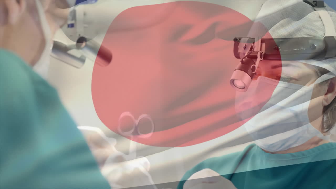 Animation of flag of japan over caucasian surgeons during surgery
