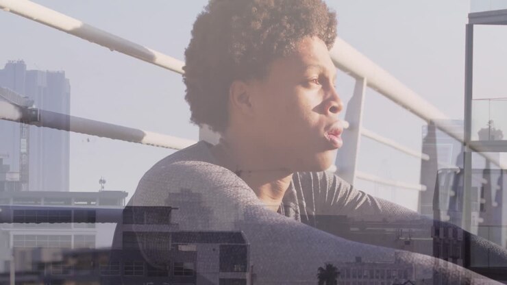 Animation of african american man resting after running over cityscape