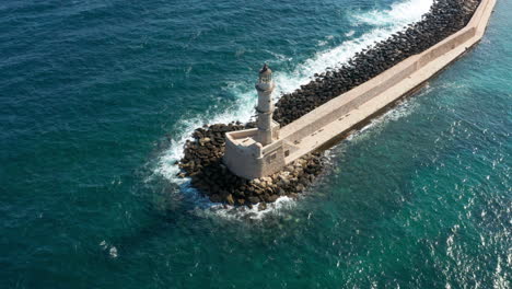 venetian lighthouse of chania at the port in crete island, greece