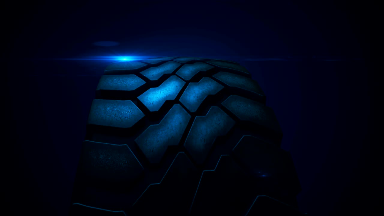 cerrar el neumático de coche sin costuras en cámara lenta con el destello de la lente