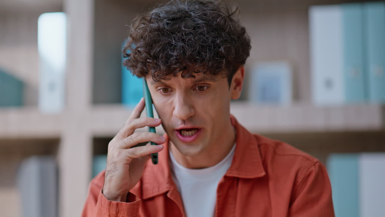 Calling director complaining mistake in calculations at office desk closeup