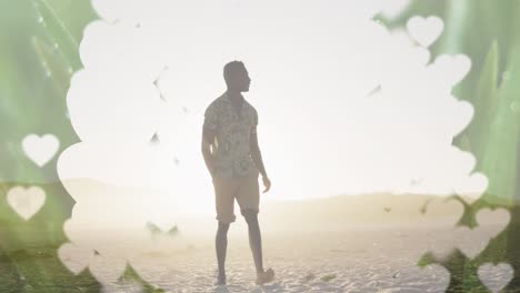 Animation-of-banner-with-copy-space-over-african-american-man-walking-at-the-beach