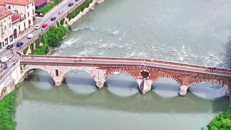 Arch-bridge-Ponte-Pietra-Adige-river-Verona-Italy-aerial