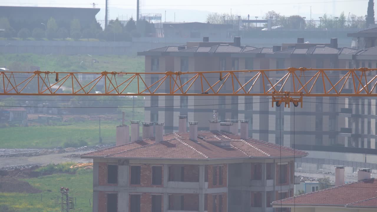 Construction crane above a construction site