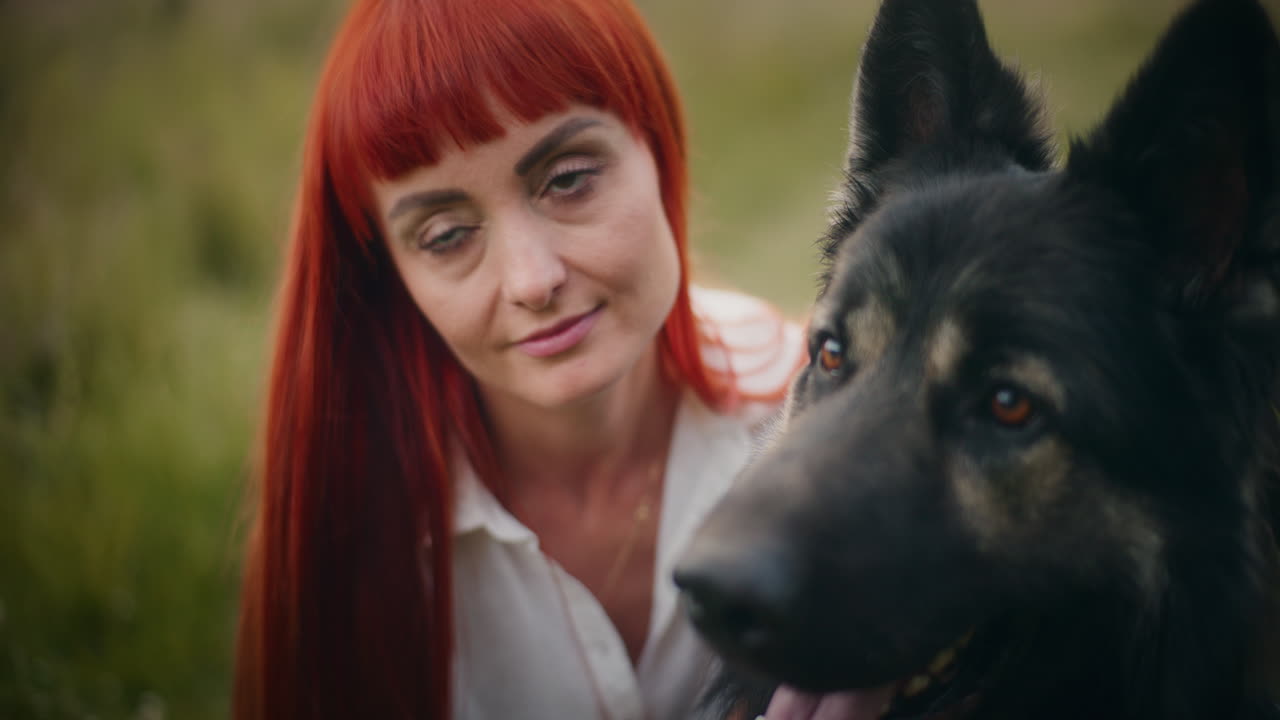 Woman and her German Shepherd dog