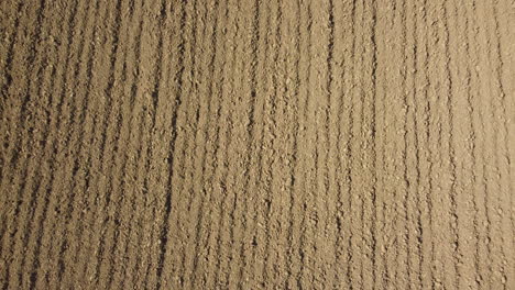Plowed-ground-soil-for-agriculture-cultivation-aerial-view