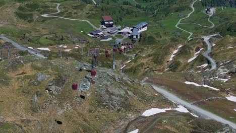 beautiful green valley at kitzsteinhorn ski resort and cable cars transport occupants up the alps