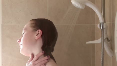 a woman relaxing in the shower