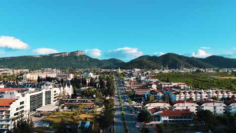 Drone-View-of-Kemer-City-of-Antalya,-Resort-Town-on-Mediterranean-Coast-of-Turkey