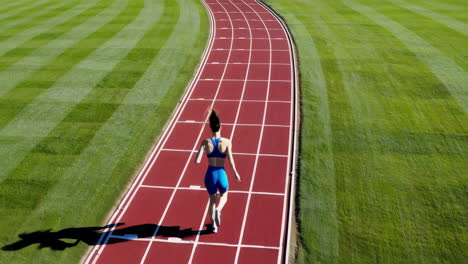 female athlete running on a red track, aerial view