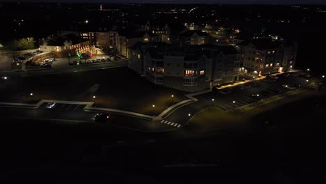 aerial view of car driving in retirement home community at night