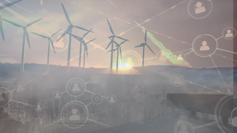 animation of icons and wind turbines over clouds