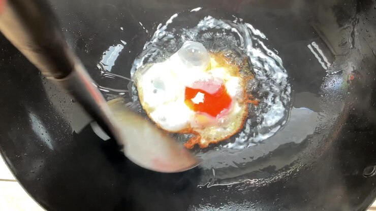Fried egg in hot oil