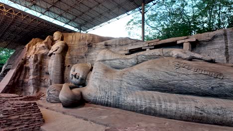 the serene reclining buddha statue at gal vihara, a historic rock temple in polonnaruwa, sri lanka, showcasing ancient craftsmanship and spiritual tranquility.