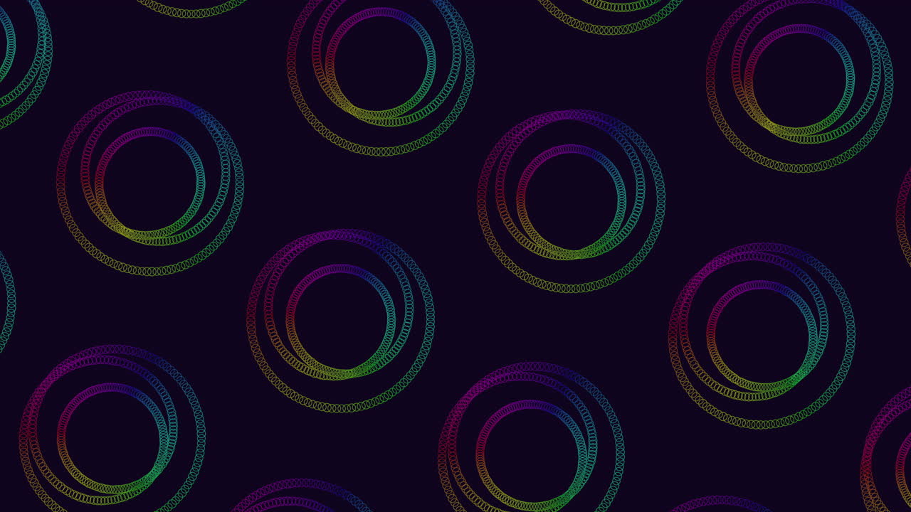 círculos coloridos vibrantes en un patrón de espiral simétrico sobre un fondo negro