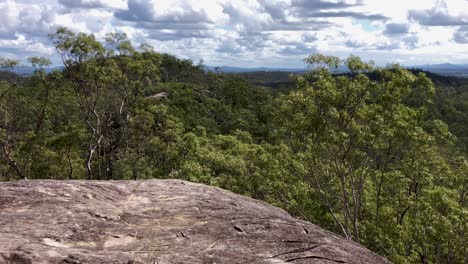 Panning-left-to-right-view-from-top-of-mountain-at-valleys-below