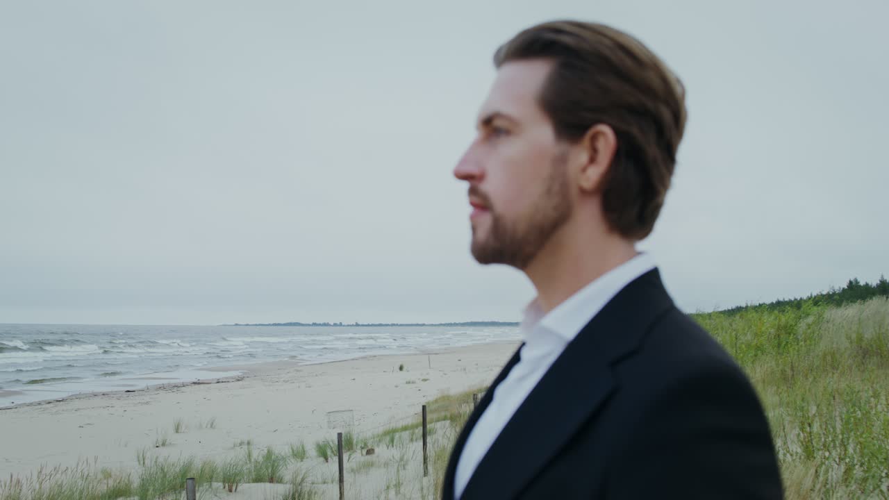 Man in Suit at the Beach