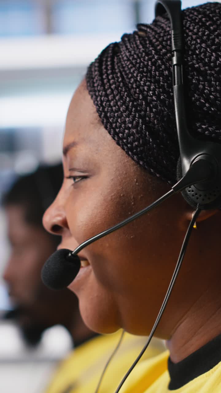 Vertical Video Customer support black engineer at help desk in photovoltaic facility