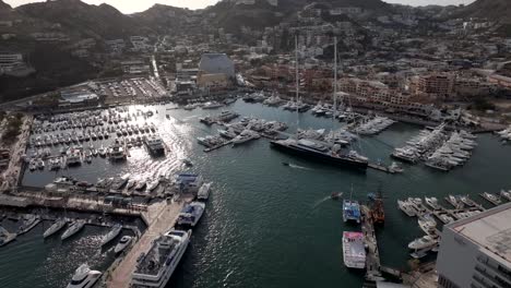 daytime view of the marina in cabo san lucas mexico, establishing aerial fly over