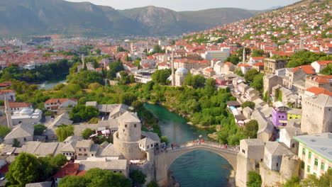 Aerial-Of-Reconstructed-Mostar-Bridge-At-The-Historic-City-Along-Neretva-River-In-Bosnia-and-Herzegovina