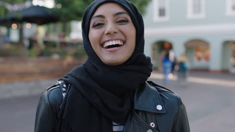 close-up-portrait-of-cheerful-muslim-woman-tourist-laughing-happy-enjoying-urban-travel