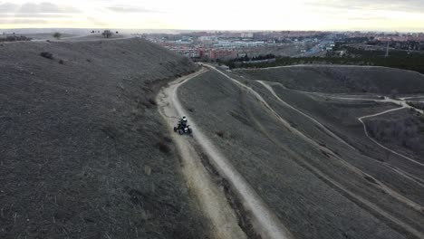 quad driving in the hills of madrid