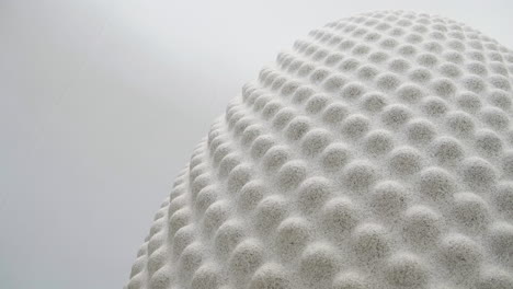 low angle view of the huge seed-shaped sculpture at the eden project in cornwall, uk - macro