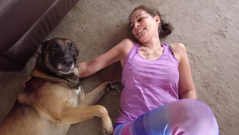 top view of happy woman taking free time with her dog