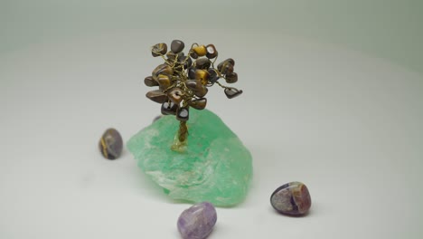 a beautiful crystal stone in a turntable very attractive - close up shot