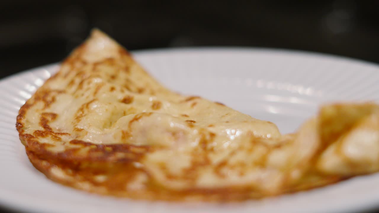 Freshly Cooked Delicious Pancake on Plate with Shallow DOF. Traditional British Dessert or Breakfast Ready to Eat. Plated Food Product Photography.