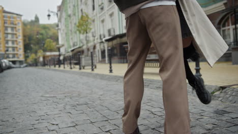 closeup people legs on city street