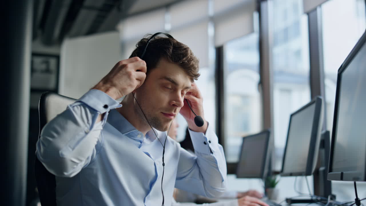 Support agent take headset talking client. Professional assistant work in office