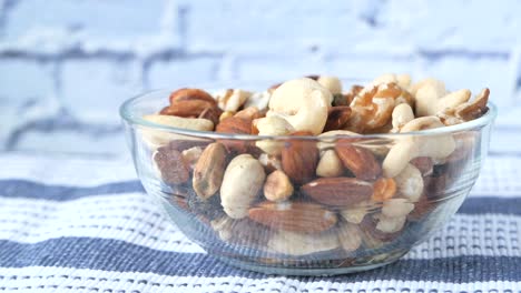 mixed nuts in a glass bowl